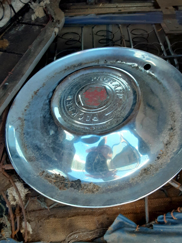1953 Packard Cavalier another hubcap inside the car.