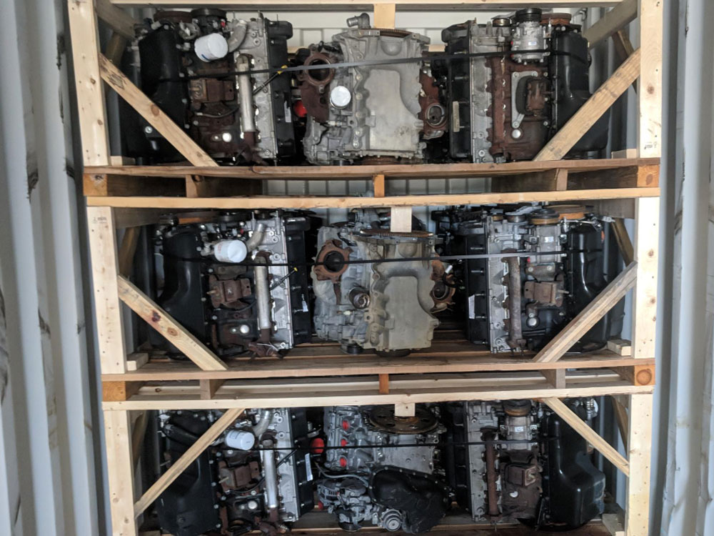 We can get 18 “v” engines or 27 4cylinder engines every 5’ of floor in the container. Depending on your customers’ requirements, these are trimmed, washed, drained, and plugged. We also do a custom oil filter plug if they need the filter off.